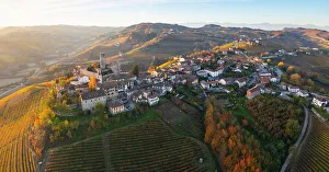 Roof Prints: Aerial view of Castiglione Falletto at sunrise during autumn