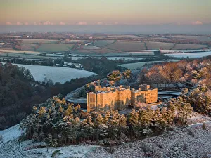 December Prints: Aerial view of Castle Drogo on a snowy winter morning