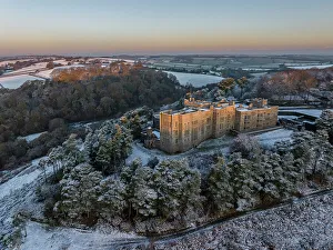 December Prints: Aerial view of Castle Drogo on a snowy winter morning