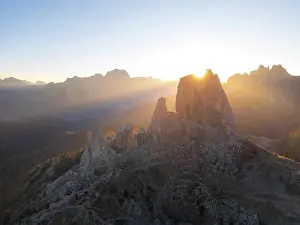 Cadore Prints: Aerial view of Cinque Torri in on an autumn morning with the Dolomites in the background near Cortina d'Ampezzo