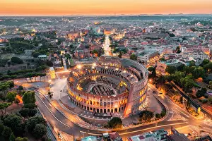 Ancient Monument Prints: Aerial view of Colosseum at twilight. Rome, Lazio, Italy