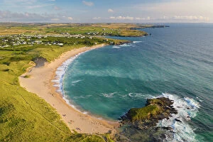 Images Dated 8th April 2022: Aerial view of Constantine Bay in North Cornwall on a sunny summer evening, Cornwall, England