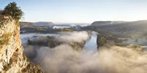 Aerial view of the Dordogne Valley & Dordogne river on a misty morning in autumn, Lot