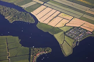 Images Dated 8th July 2021: Aerial view of the Dutch canals approaching the Schispol airport, near Amsterdam, Holland