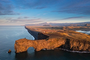 High View Prints: Aerial view of the Dyrholaey arch and cliff at sunrise