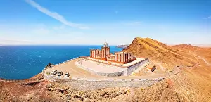 Red Rocks Prints: Aerial view of Entallada lighthouse on majestic cliffs overlooking the ocean