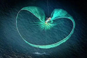 Straight Down Prints: Aerial view of fishing boat using nets for anchovies, Tuy An, Phu Yen Province, Vietnam