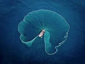 Straight Down Prints: Aerial view of fishing boat using nets for anchovies, Tuy An, Phu Yen Province, Vietnam