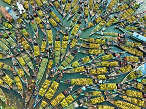 Images Dated 20th July 2023: Aerial view of floating market of seasonal fruits on the boats in Kaptai Lake, Rangamati, Bangladesh