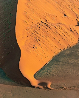 Sossusvlei Prints: Aerial view of golden sand dunes from helicopter