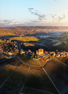 Borgo Prints: Aerial view of Grinzane Cavour at sunrise during autumn