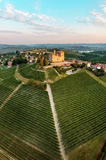 Vine Prints: Aerial view of Grinzane Cavour village at sunrise