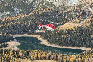 Province Of Sondrio Prints: Aerial view of helicopter in flight on Lake Pal√πduring autumn