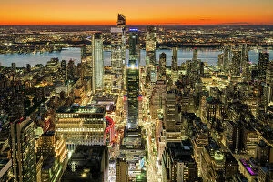 Aerial view of Hudson Yards and Midtown Manhattan skyline at sunset, New York, USA