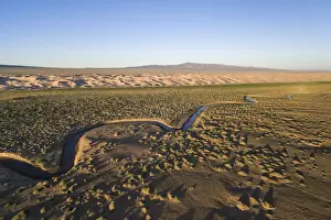 Aerial view of a Khongoriin river and Khongor dunes in Gobi Gurvan Saikhan National Park