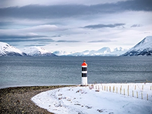 Mountain Peak Prints: Aerial view of a lighthouse overlooking the fjord, Tromso, Norway