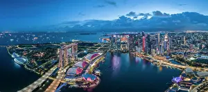 Aerial view of Marina Bay Sands and Singapore City Harbour at night, Singapore, Asia