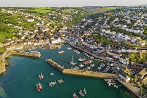 Aerial view of Mevagissey harbour on the south coast of Cornwall, England. Spring (June) 2022