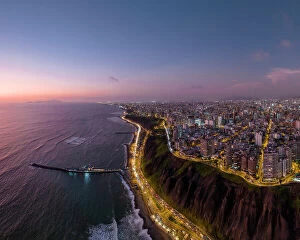 Images Dated 4th May 2023: Aerial view over Miraflores at dusk, Lima, Peru, South America