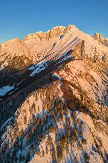 Massif Prints: Aerial view of Monte Gulter and the Presolana massif after a winter snowfall at sunrise
