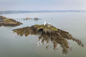 Swansea Prints: Aerial view of Mumbles Lighthouse and Pier at the eastern edge of the Gower Peninsula