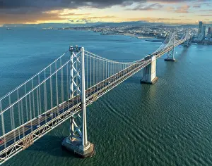 Suspension Bridge Prints: Aerial View Oakland Bridge, sunset San Francisco California, USA