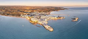 Images Dated 18th May 2021: Aerial view of old town and lighthouse of Vieste at dawn, Foggia province