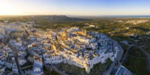 Aerial view of the old town of Ostuni at sunset, Apulia, Italy