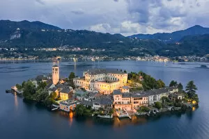Images Dated 14th August 2019: Aerial view of Orta San Giulio and Lake Orta at blu hour before a storm. Orta Lake