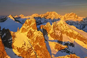 Aerial Shot Gallery: Aerial view of peaks Torrone and Bernina Group at sunset Masino Valley Valtellina