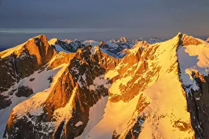 Aerial Shot Gallery: Aerial view of peaks Torrone and Cima of Castello at sunset Masino Valley Valtellina