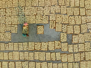 Business Collection: Aerial view of people working in the traditional vermicelli factory in Bogura, Bangladesh
