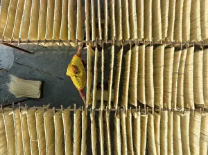 Aerial view of people working in the traditional vermicelli factory in Bogura, Bangladesh