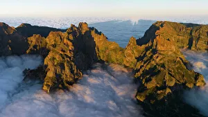 Above The Clouds Prints: aerial view of Pico do Arieriro during a warm spring sunset, Madeira, Portugal