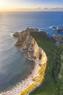 Aerial view of playa del Silencio (beach of silence) at sunset