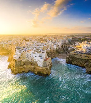 Aerial view of Polignano a Mare at sunrise. Polignano a Mare, Apulia, Italy Aerial view of Polignano a Mare at sunrise. Polignano a Mare, Apulia, Italy