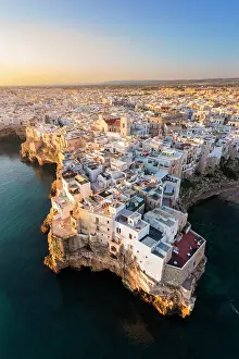 Adriatic Sea Prints: Aerial view of Polignano a mare at sunrise. Bari province, Apulia, Italy