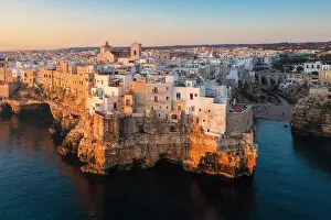 Adriatic Sea Prints: Aerial view of Polignano a mare at sunrise. Bari province, Apulia, Italy