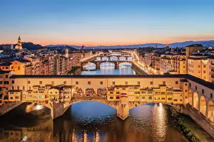 Arno Prints: Aerial view of Ponte Vecchio and Arno river at dusk. Florence, Tuscany, Italy