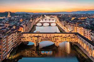 Arno Prints: Aerial view of Ponte Vecchio and Arno river at dusk. Florence, Tuscany, Italy