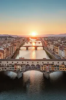 Arno Prints: Aerial view of Ponte Vecchio and Arno river at sunset. Florence, Tuscany, Italy