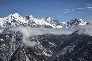 Predarossa Prints: Aerial view of Predarossa Valley in winter with Mount Disgrazia and Corni Bruciati