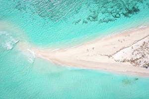 Madagascar Prints: Aerial view of a pristine beach, people in canoes. Madagascar, Africa. Nosy Ve, Anakao