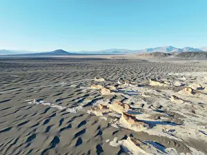 Cordillera Prints: Aerial view of the Pumice Stone Field at sunset with the Carachi Pampa volcano in background