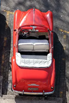 American Car Prints: Aerial view of restored classic American car used to take tourists on city tours