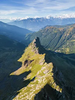 Aerial view of the Rifugio Benigni at sunset. Ornica, Val Salmurano, Val Brembana, Alpi Orobie, Bergamo, Bergamo Province, Lombardy, Italy