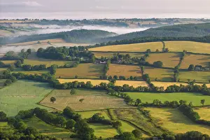 Aerial view of rolling countryside on the outskirts of Dartmoor, Devon, England. Summer (June) 2023