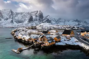 Reine Prints: Aerial view of the Sakrisoya island and Reine Bay towards Reinebringen in winter