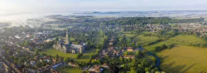 Aerial view over Salisbury and Salisbury Cathedral on a misty summer morning, Salisbury