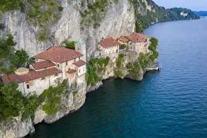 Varese District Prints: Aerial view of the Santa Caterina del Sasso Ballaro monastery, overlooking Lake Maggiore